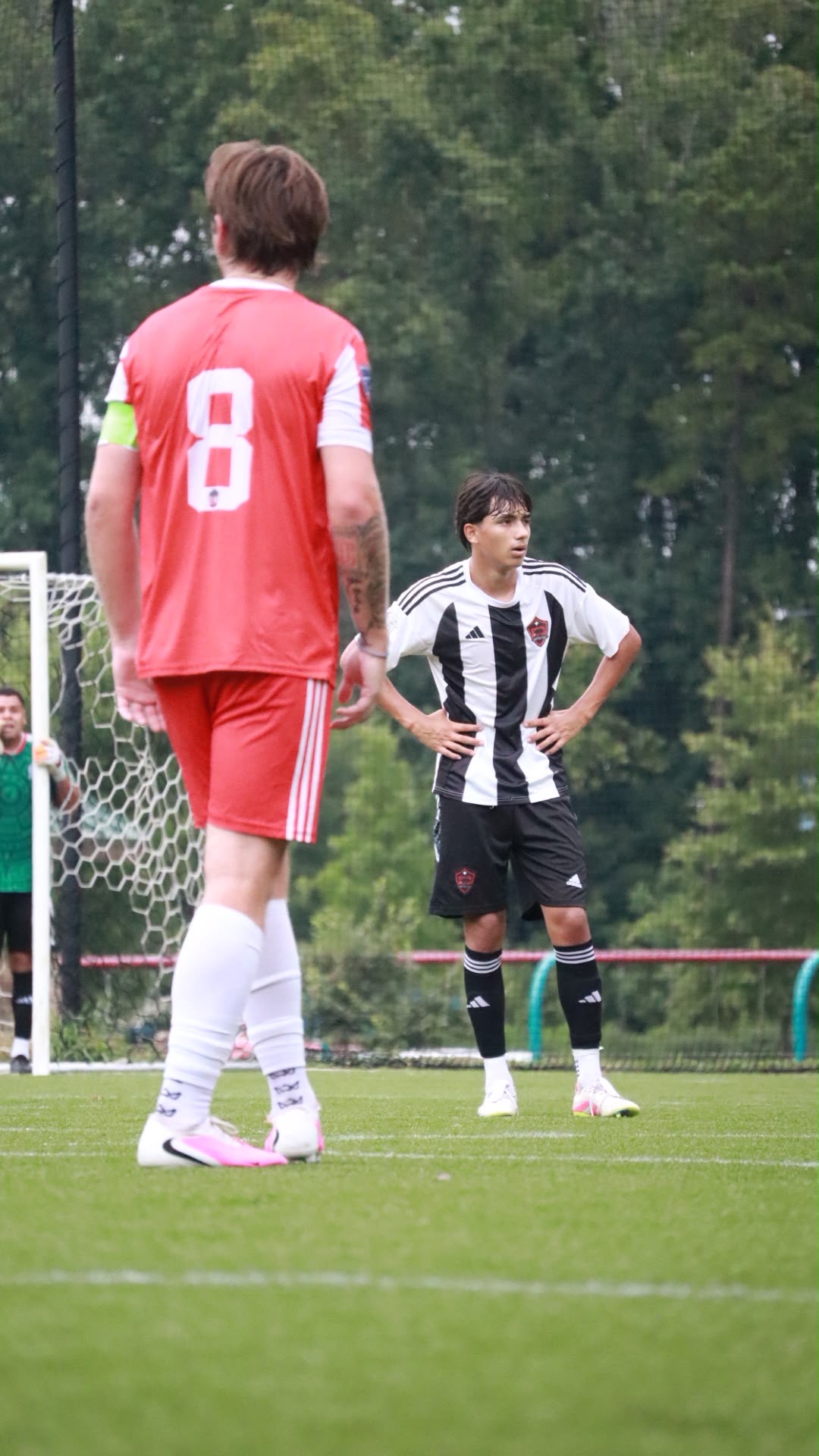 An NC United FC player facing a Gastonia City FC opponent during the August 22 preseason friendly