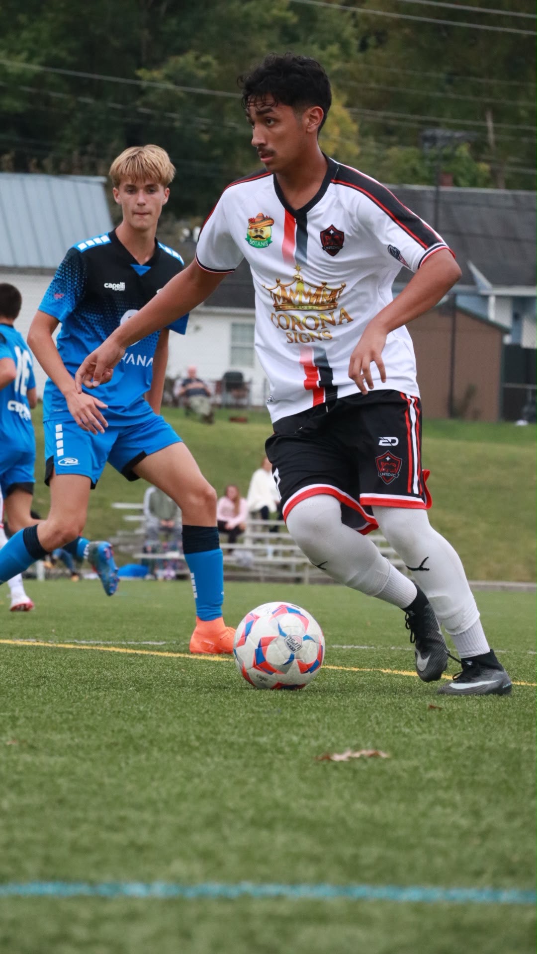 NC United FC U17 Academy player controlling the ball with Rush United players nearby during the October 4 away victory.