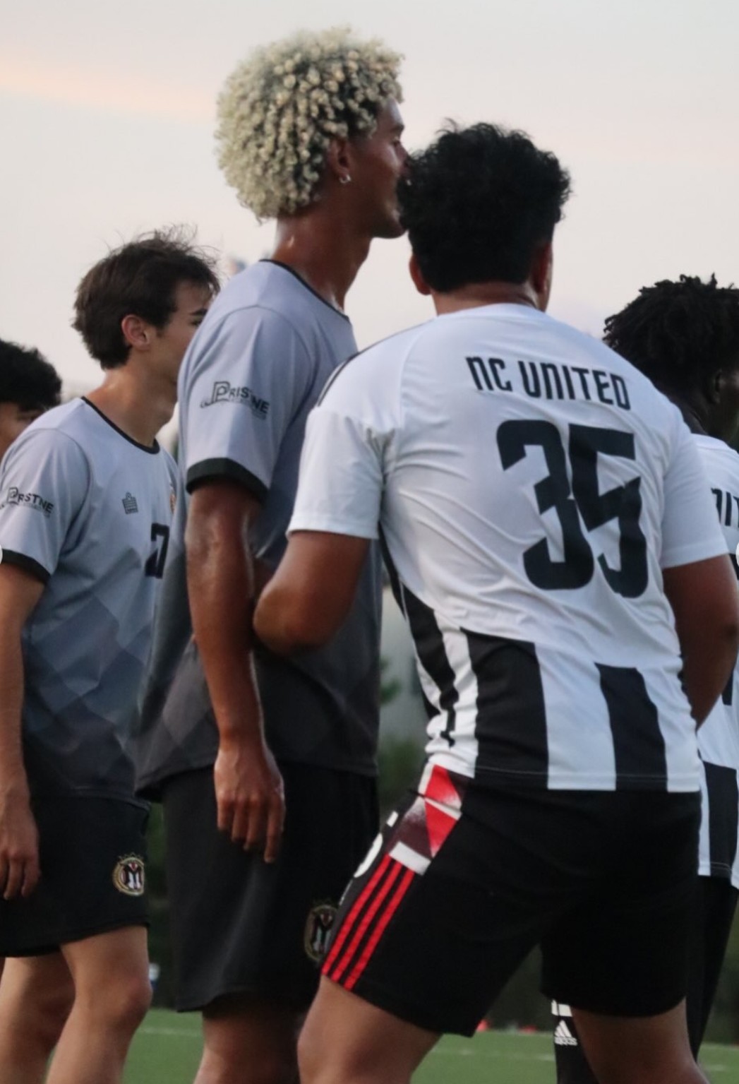 NC United FC players competing against Queen City Mutiny during the September 9 preseason match.
