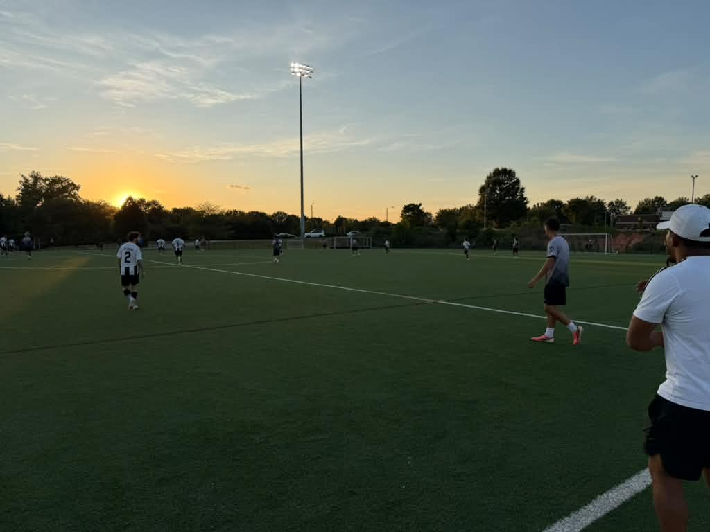 NC United FC competing against Queen City Mutiny as the sun sets during their September 9 preseason friendly.