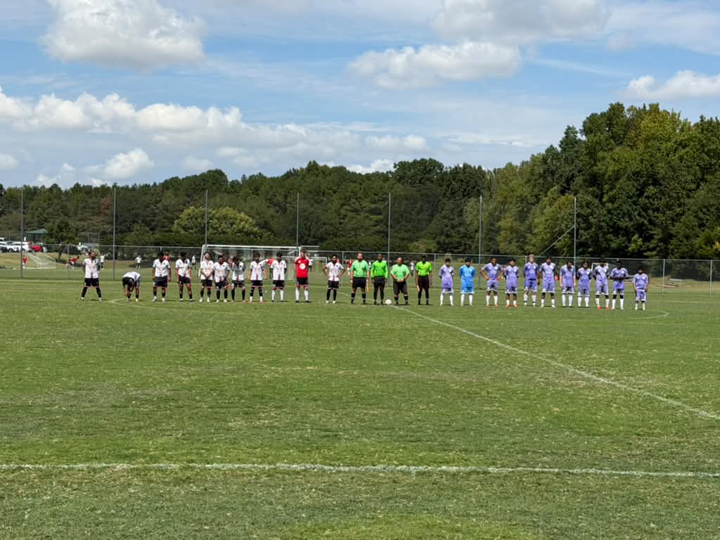 NC United FC and Briar United FC Academy lined up with the match officials before their UPSL Men Division 1 match at Ramblewood Soccer Complex.